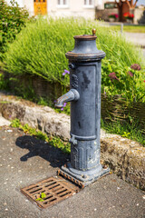 Vintage Water Pump in Chateau Landon Village Street