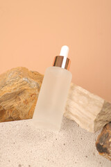 Frosted Glass Dropper Bottle on Stone for Natural Skincare and Serum Mockup