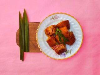 Boiled Cassava with Palm Sugar, is a traditional Indonesian dessert made from boiled cassava,...