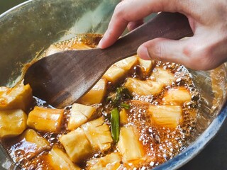 The process of making Boiled Cassava with Palm Sugar, is a traditional Indonesian dessert that combines the sweet taste of palm sugar and the soft texture of cassava.