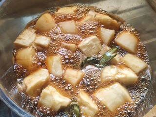 The process of making Boiled Cassava with Palm Sugar, is a traditional Indonesian dessert that combines the sweet taste of palm sugar and the soft texture of cassava.
