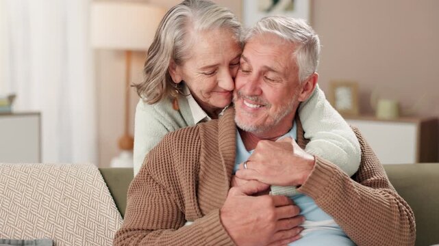 Senior couple, hug and happy in home with retirement, healthy relationship and marriage commitment. Smile, elderly man and woman with embrace in lounge for love bonding, support and loyalty with care
