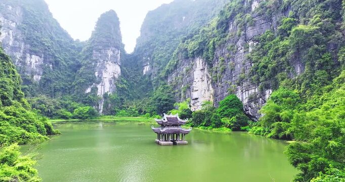 Landscape of Vu Cung at Tam Coc National Park. It was the place where the Tran Dynasty's struggle against the Nguyen Mong army took place and was also the practice place for feudal kings in Vietnam.
