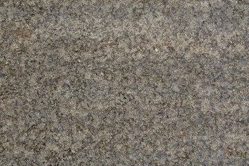 Rough asphalt surface  with crushed stone