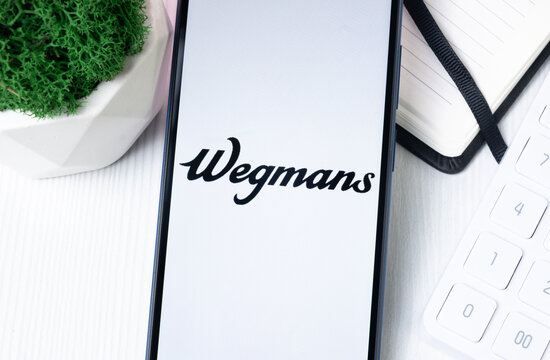 New York, USA - 1 August 2024: Wegmans Logo on Phone Screen, Company Icon on Display