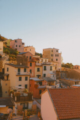 Obraz premium View of Riomaggiore in Cinque Terre, Italy during golden hour.
