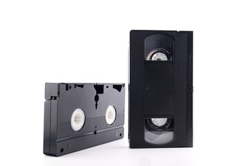 two vintage black VHS video tapes