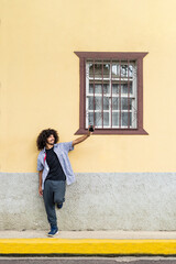 Young man taking a photo on the street