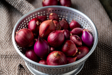 Red onions.
Image of fresh red onions.