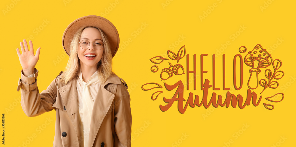 Canvas Prints Beautiful young stylish woman waving hand on yellow background