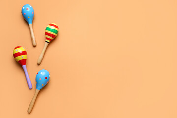 Mexican maracas on orange background