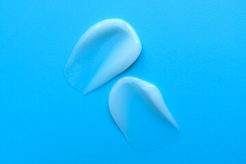 A smear of cream on a light background. Beauty concept.