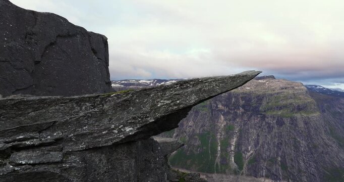 Aerial Boom Shot Reveals Popular Trolltunga Cliff Above Lake Ringedalsvatnet
