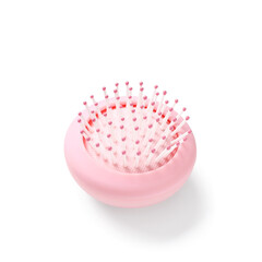 Pink hair brush on white background