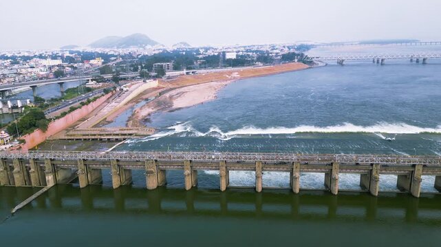 Panoramic view of historic Prakasam barrage on the Krishna river at Vijayawada, India.