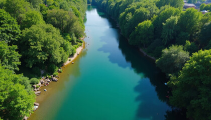 Aerial view of river in tropical green forest with rocks, background