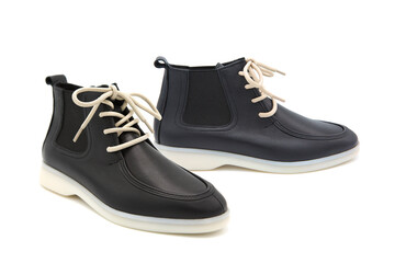 Pair of fashionable stylish leather high lace-up loafers shoes isolated on white background. View from all sides.