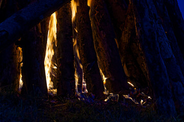Beautiful bonfire on meadow on August 1st national holiday of Switzerland at Swiss City of Zürich on a summer night. Movie shot August 1st, 2024, Zurich, Switzerland.