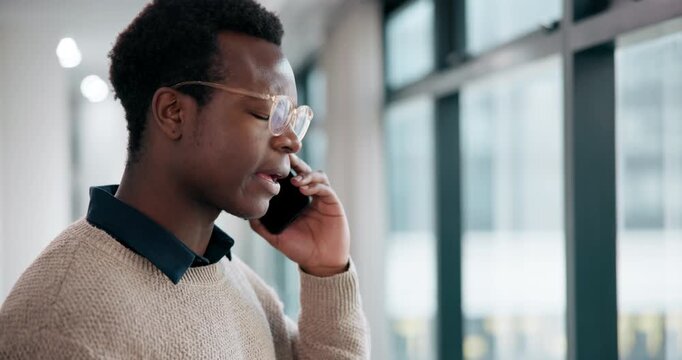 Black man, phone call and stress in office for business, crisis and unfair dismissal. Disappointed, male intern and mobile at window for conversation, argument and anxiety or frustrated in city