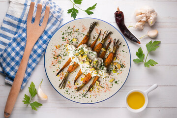 Oven roasted carrots with Italian burrata and pistachios.