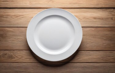 Top view of a white plate on a wooden background, for products presentation