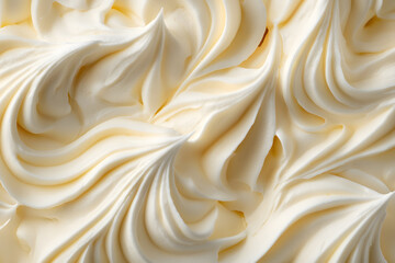 Obraz premium Soft whipped butter textured background. Creamy surface and texture is swirled and mixed