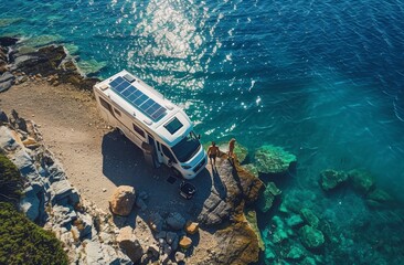 Camper van with solar panels on top of the roof standing close beside the seas, eco-friendly installation, travel vacation, scenic photography