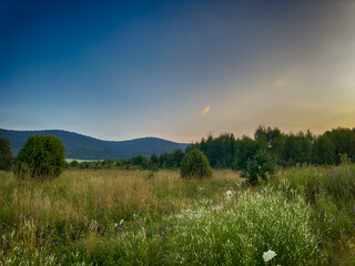 Wonderful landscape view on the Carpathian Mountains during the sunset in the summer season 