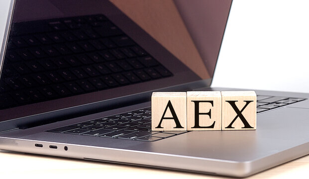 AEX word on wooden block on a laptop , business concept