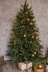 Home New Year's interior. Christmas tree with gifts, decorated with garlands. Cozy atmosphere of a home holiday, loft design of the room, Scandinavian style