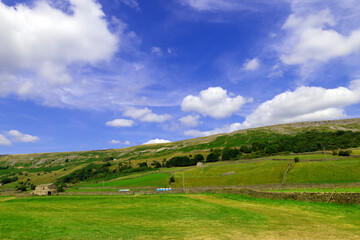 Sunglow across Reeth in July, 2024.
