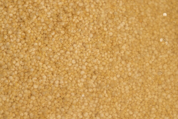 a large amount of quinoa porridge floats in clean water