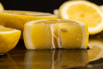 ripe sliced lemon on a board