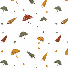 Seamless autumn pattern. Bright umbrellas with leaves on white background. Rainy weather. Can be used as gift paper, card and wallpaper.Perfect background for banner, poster, flyer, cover.