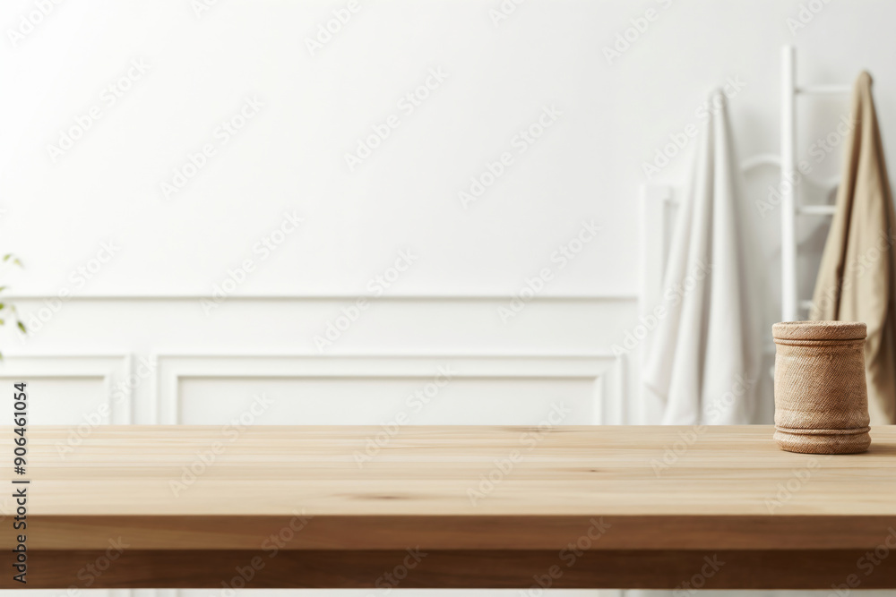 Poster empty wooden table top with copy space for your product or design over blurred white room background