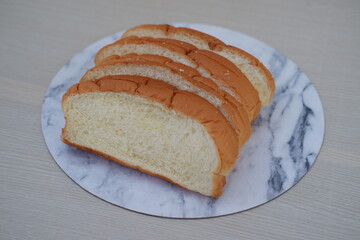 Sliced bread on a marble table 