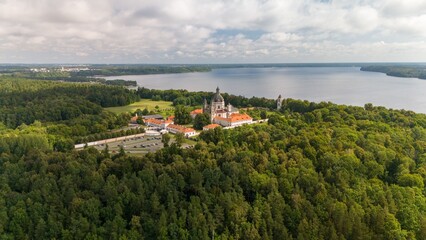 Obraz premium Aerial view of Pazaislis Monastery, a historic building surrounded by greenery in Kaunas, Lithuania