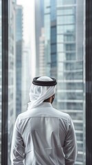 A man wearing a white shirt