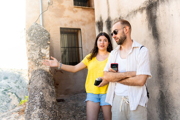 Romantic travel adventure: couple enjoying the urban streets