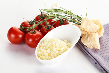 Shredded Italian hard parmesan cheese