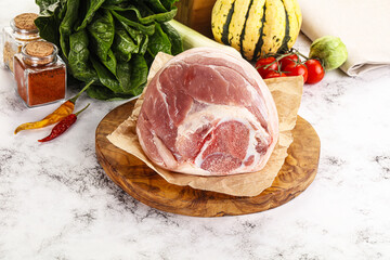 Uncooked raw pork knuckle with spices