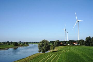Landscape with wind turbines and the river IJssel between Arnhem and Westervoort, the Netherlands...