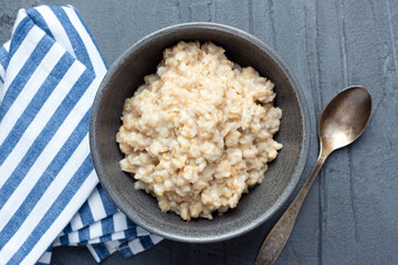 Steel cut oatmeal bowl, top view copy space