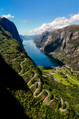 Winding Roads of Norway's Majestic Fjords Under a Clear Blue Sky, Lysefjord Lysebotn Norway
