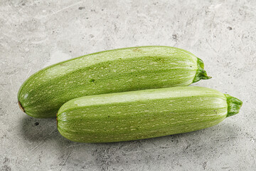 Raw green ripe zucchini vegetable
