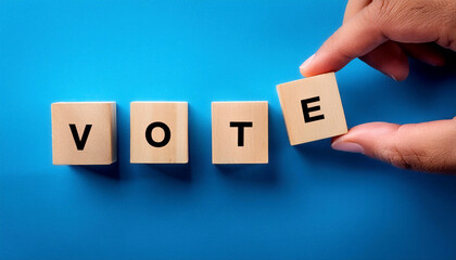 Generate set of wooden blocks spelling out the word "VOTE" against a blue background. One block is being placed by a hand, emphasizing the act of voting. Ideal for themes related to elections, d image