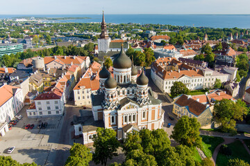 Fototapeta premium Aerial view of Alexander Nevsky Cathedral in Tallinn Old Town on a sunny summer morning. St. Mary's Cathedral, defensive walls, rooftops.