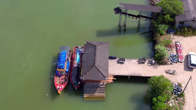 Terengganu, Malaysia, March 14, 2023: Overhead view of a fisherman boat at the jetty in Besut.