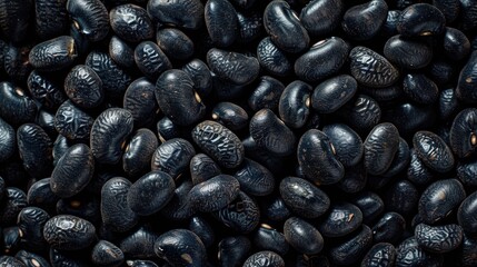 Obraz premium Close up of raw black turtle beans on a square food background