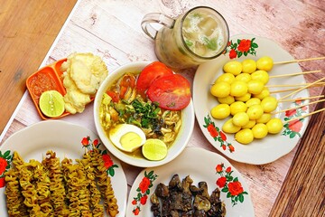 Chicken soup or Chicken Soto or Soto Ayam in Indonesia. Soto ayam is a traditional Indonesian dish which uses ingredients such as chicken, vermicelli, bean sprout with turmeric